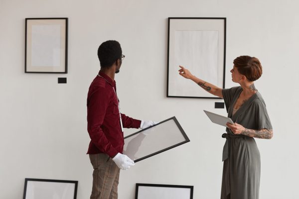 female-manager-planning-exhibition-in-museum-2025-03-09-13-09-16-utc