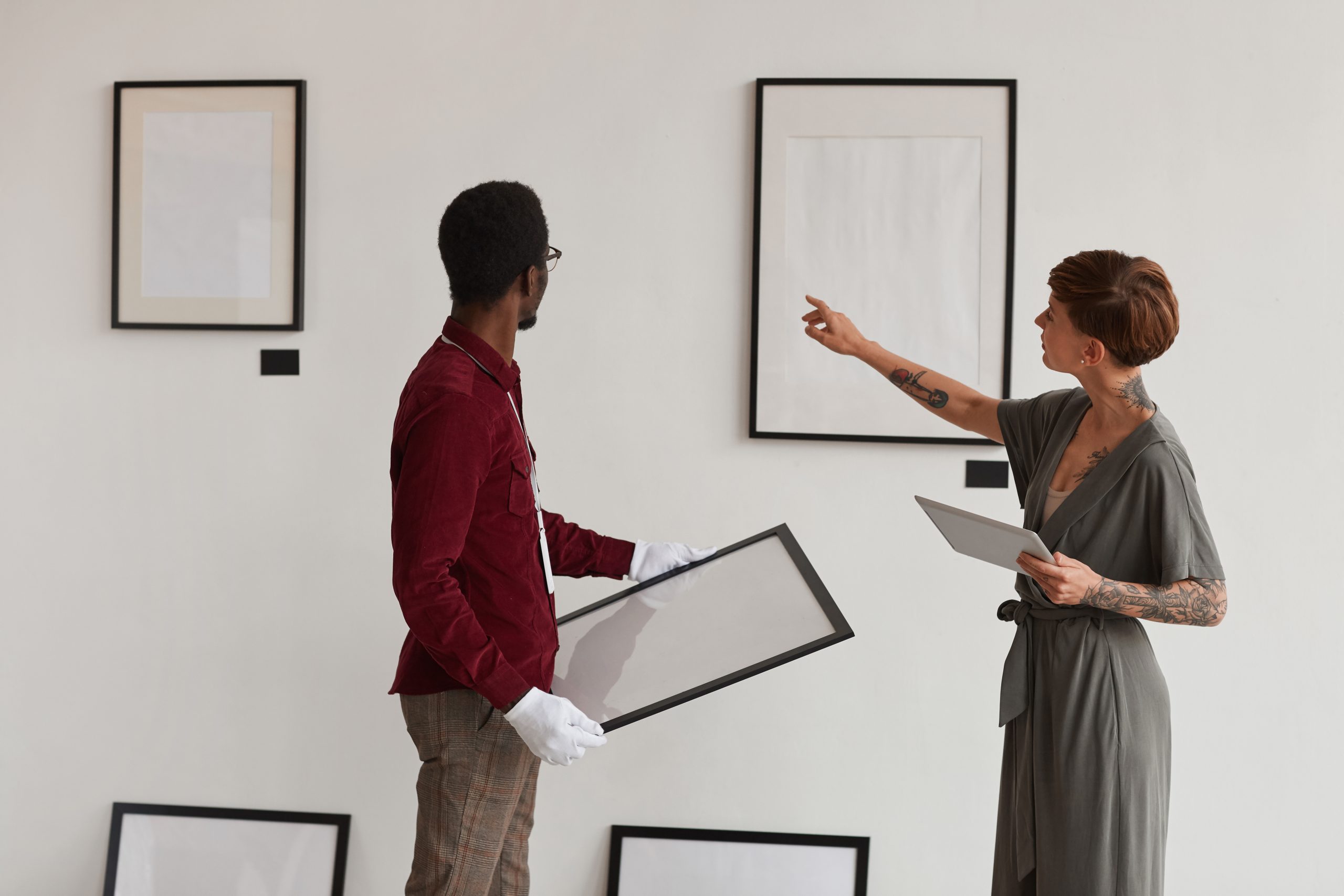 female-manager-planning-exhibition-in-museum-2025-03-09-13-09-16-utc