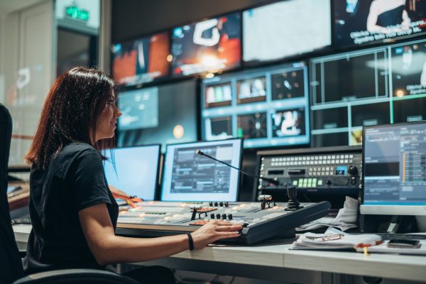 young-beautiful-woman-working-in-a-broadcast-contr-2023-11-27-05-29-08-utc