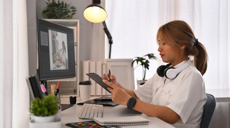 creative-woman-using-digital-tablet-working-on-de-2024-11-28-12-12-19-utc creative-woman-using-digital-tablet-working-on-de-2024-11-28-12-12-19-utc