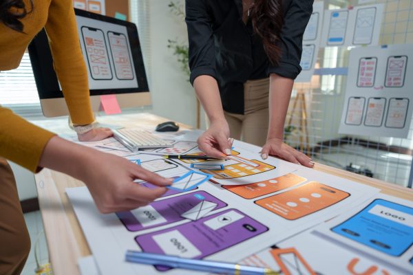 two-female-ux-designers-are-collaborating-on-a-pro-2025-02-20-03-55-55-utc