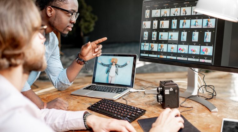 two-photographers-working-on-the-computers-in-the-2025-03-13-03-08-29-utc two-photographers-working-on-the-computers-in-the-2025-03-13-03-08-29-utc